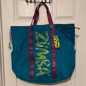 NWT Zumba Blue drawstring Tote Bag with Purple Straps